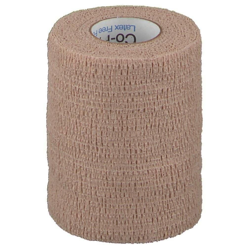 Bandage couleur chair. Inscription : Co-Plus. Sans latex.