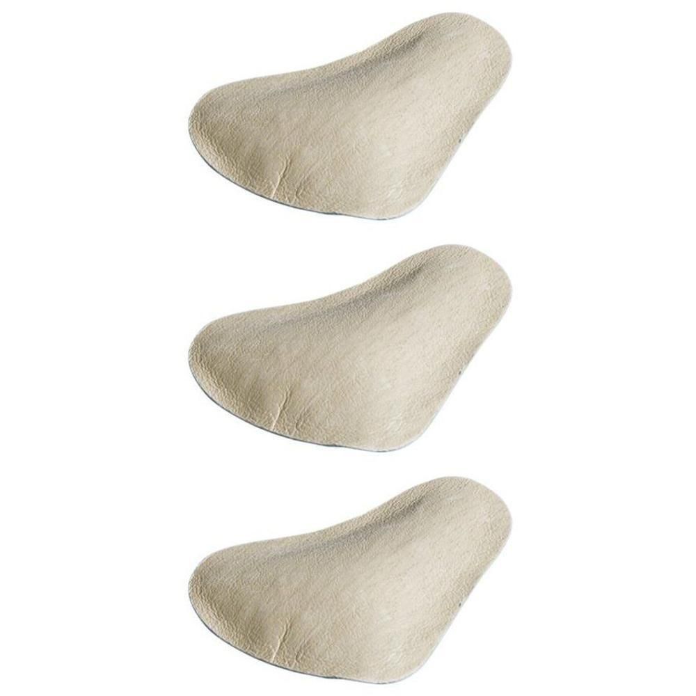 Trois coussinets de voûte plantaire beiges en tissu, forme ergonomique.