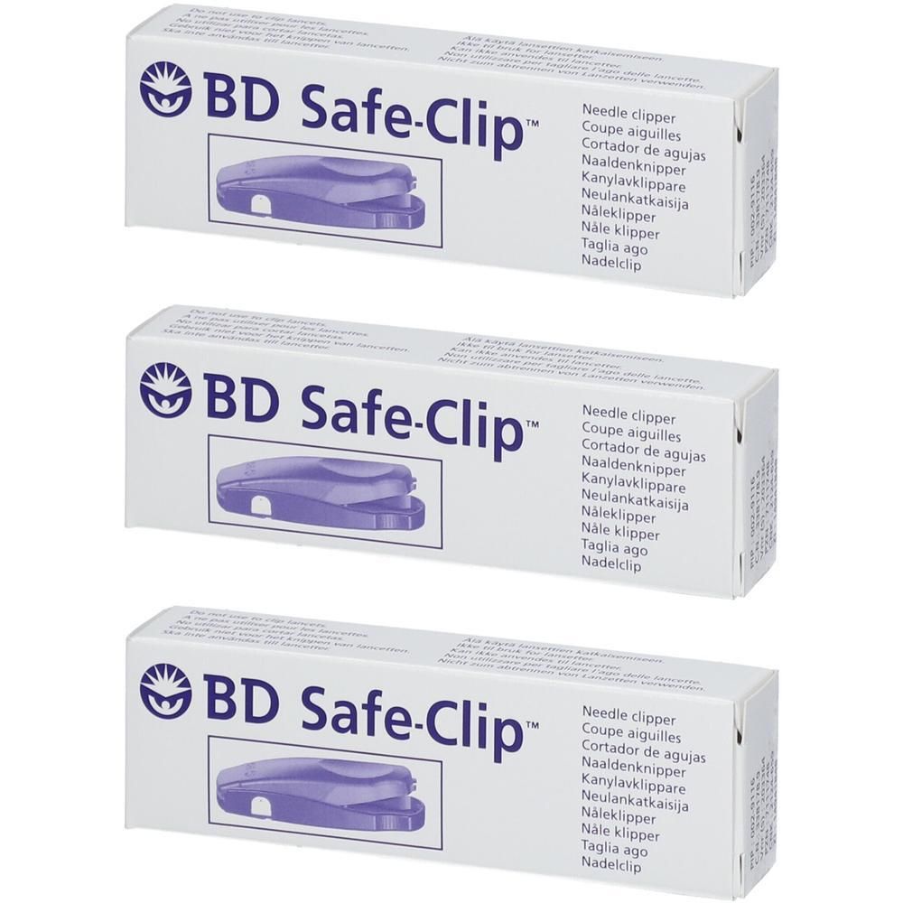 Trois boîtes de coupe-aiguilles BD Safe-Clip violets.