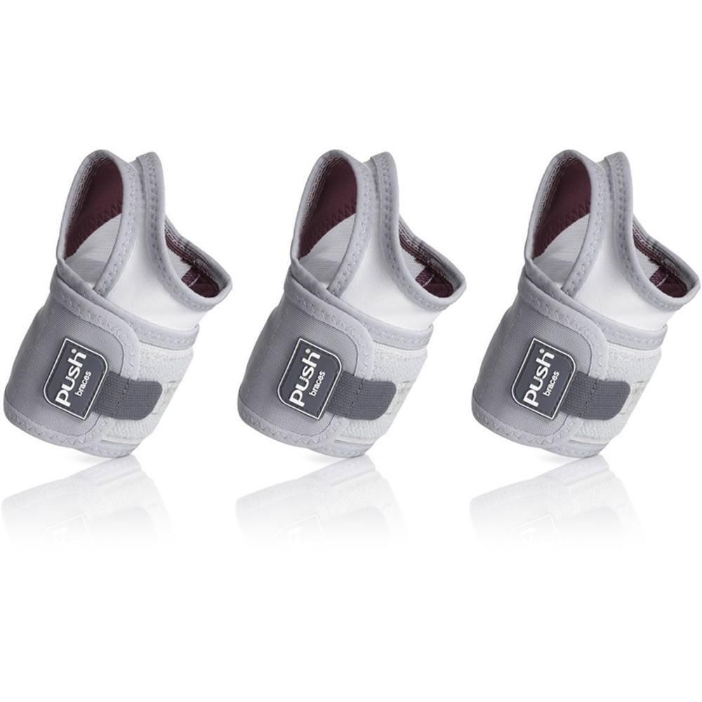 Trois orthèses de poignet Push Care grises et blanches, avec fermeture velcro et logo.