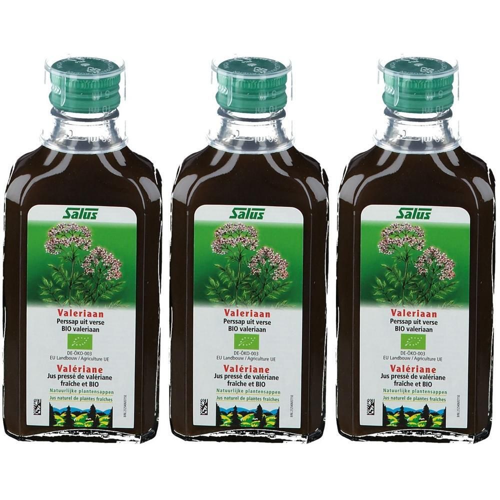Drie flessen Salus Valeriana BIO valeriaansap met groene dopjes en etiketten met een plant erop.