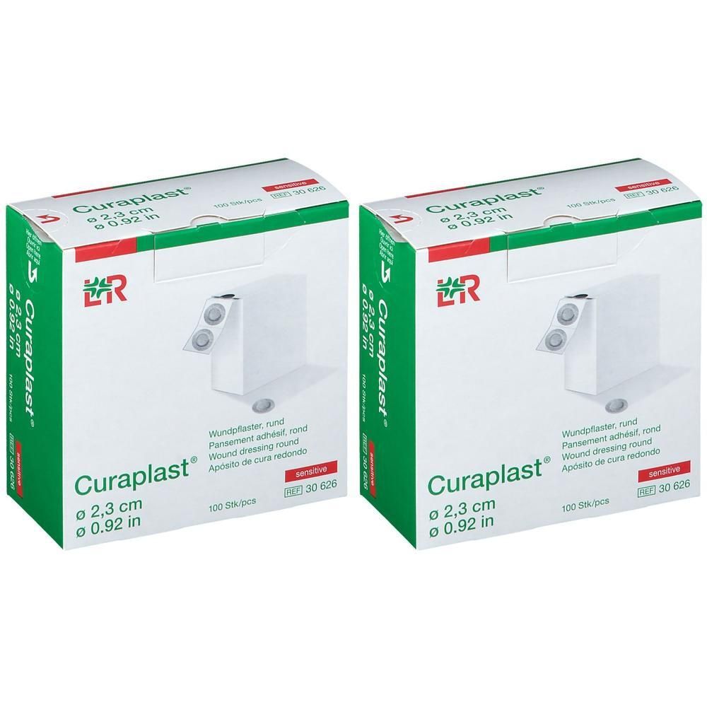 Deux boîtes de pansements ronds Curaplast, diamètre 2,3 cm.