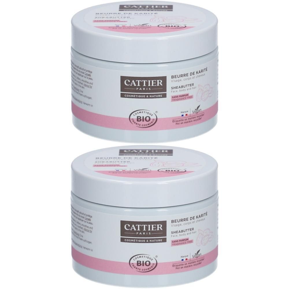Deux pots de Beurre de Karité Cattier, blancs avec bande rose. Logo BIO visible.