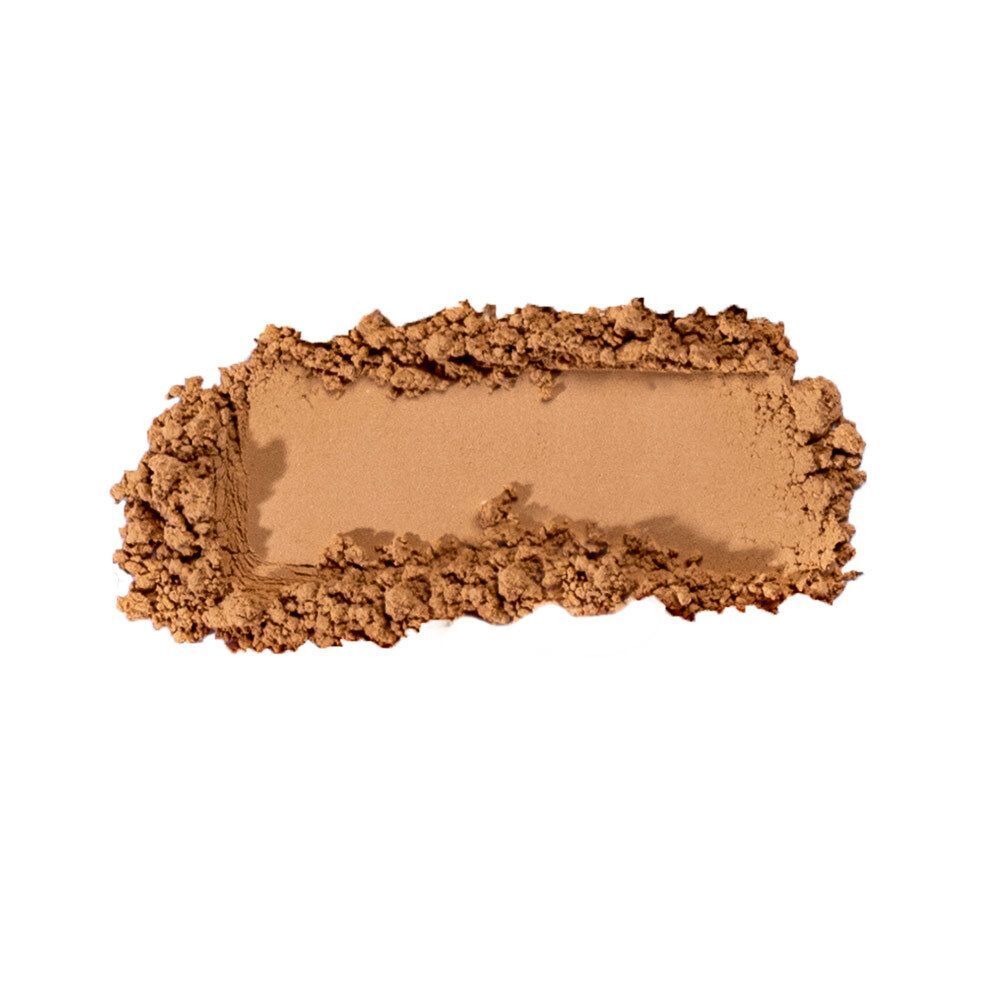 Un échantillon de T. LeClerc Poudre Libre Dermophile 06 Cannelle, poudre brune.