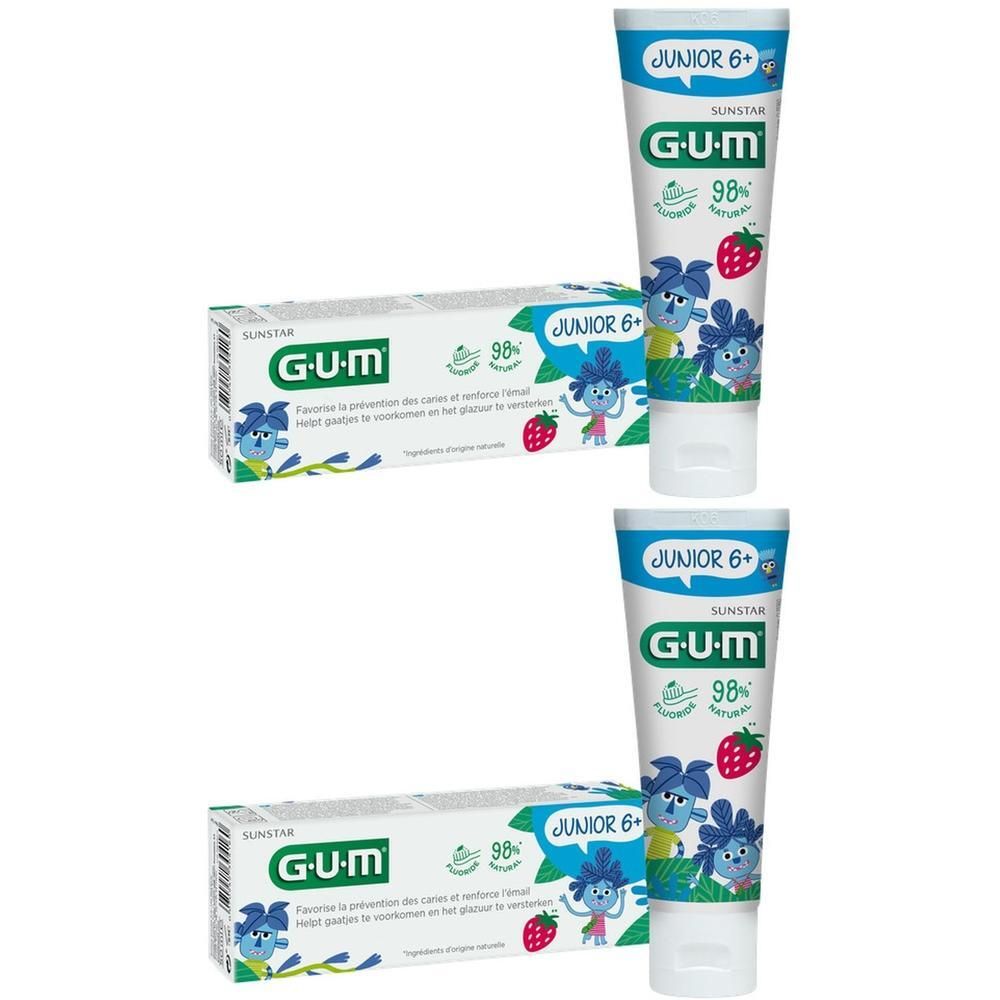 Twee tubes en dozen GUM Junior 6+ tandpasta met aardbei- en tekenfilmfiguren.