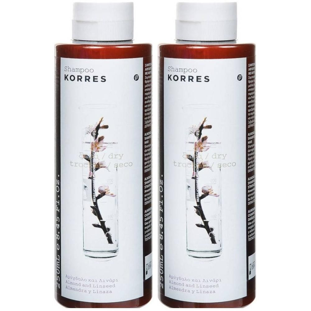 Twee flessen Korres shampoo met amandel en lijnzaad.