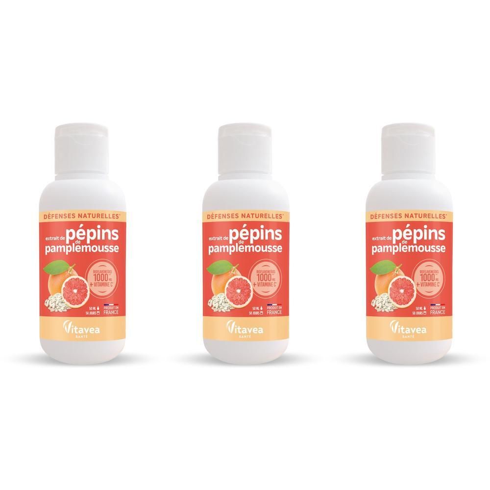 Trois flacons blancs avec étiquette d'extrait de pépins de pamplemousse. L'étiquette montre un pamplemousse et des baies blanches.
