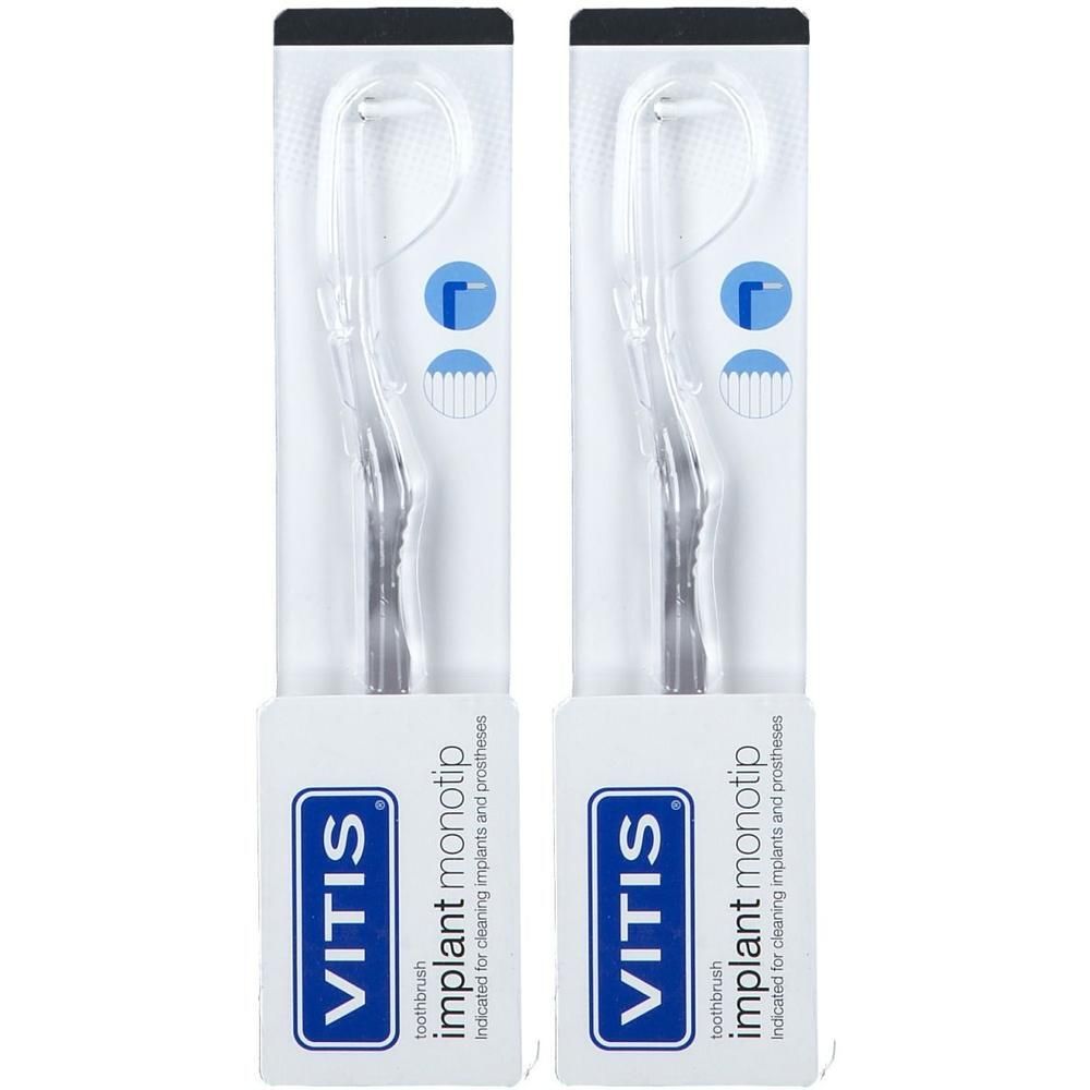 Twee Vitis Monotip Implant tandenborstels in doorzichtige verpakking. Kleine borstelkoppen met rechte borstelharen.