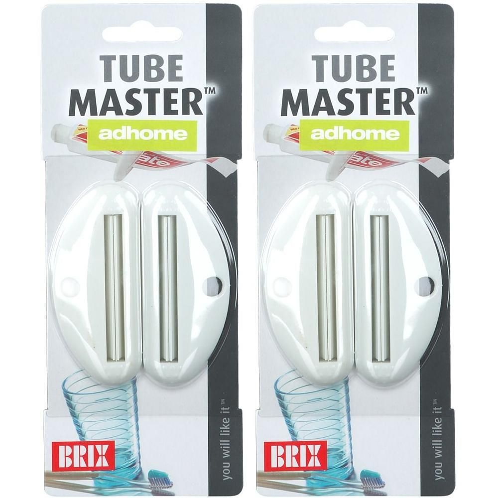 Deux presse-tubes blancs avec rouleaux argentés, emballés.
