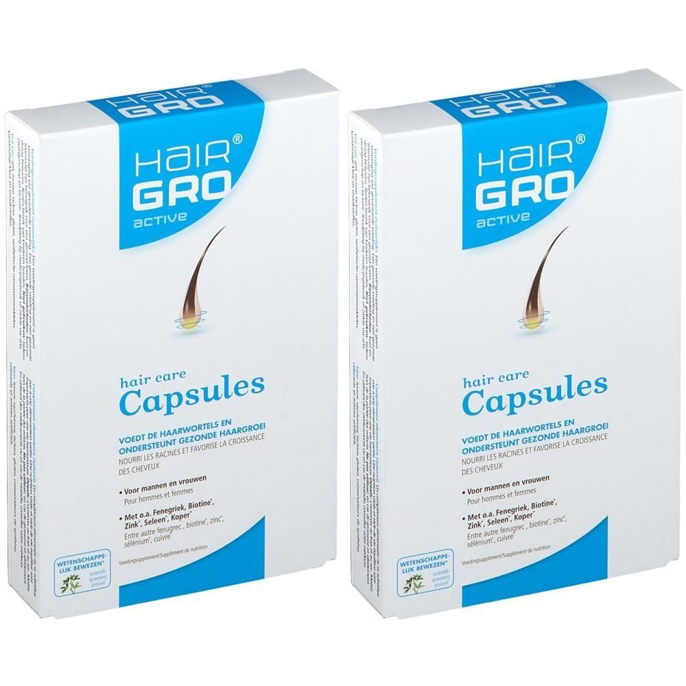 Deux boîtes de capsules Hair Gro Active pour les soins capillaires.