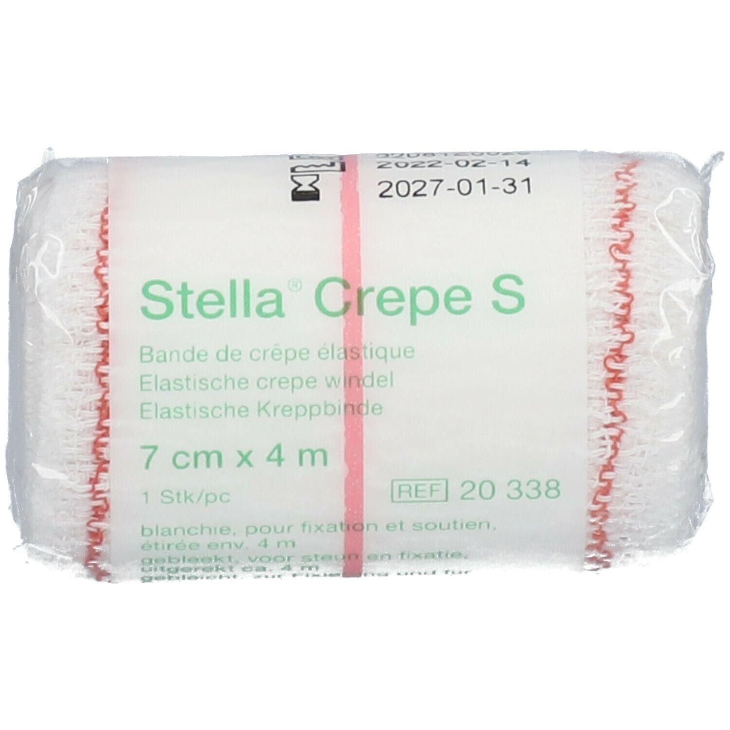Stella Crepe S elastisch verband, 7 cm x 4 m, wit met rode randen.