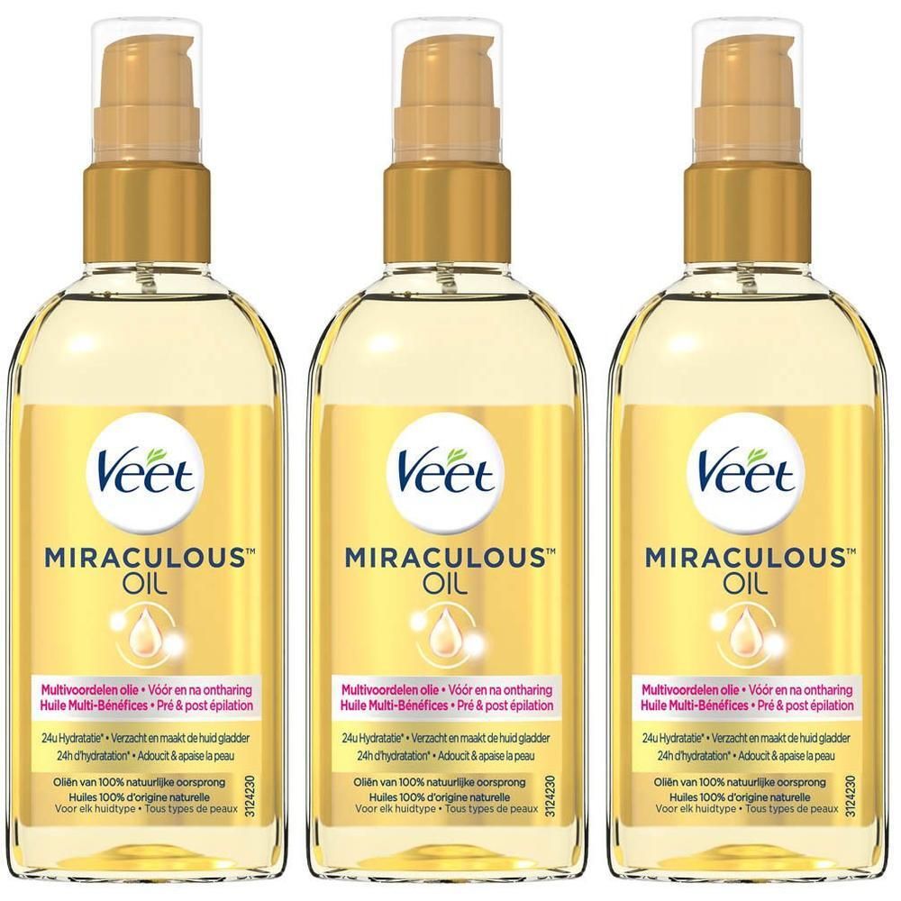 Trois flacons d'Huile Miraculeuse™ Veet Expert avec pompe.