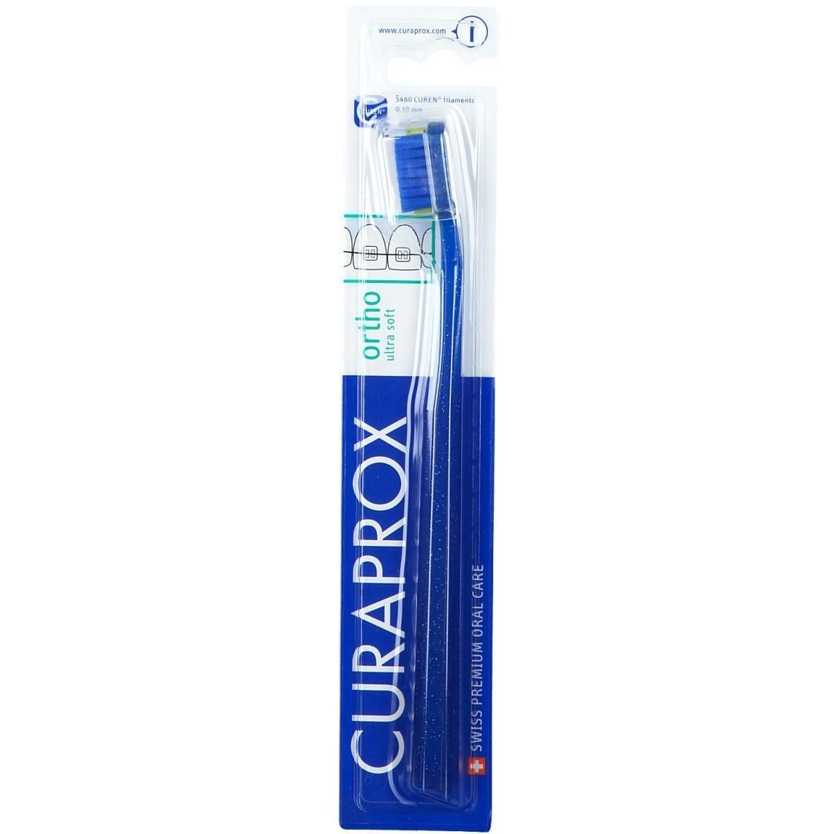 Brosse à dents bleue ultra souple pour appareils dentaires, emballée.
