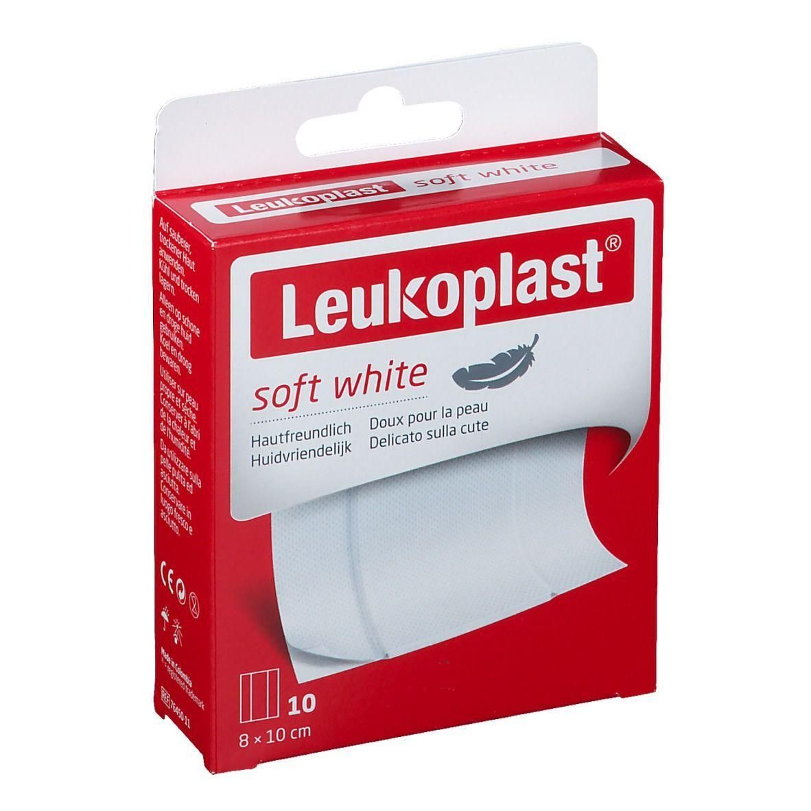 Rode verpakking met Leukoplast-logo. Opschrift 'soft white'. Bevat 10 pleisters, 8x10 cm. Tekst in het Duits, Frans, Italiaans en Nederlands.