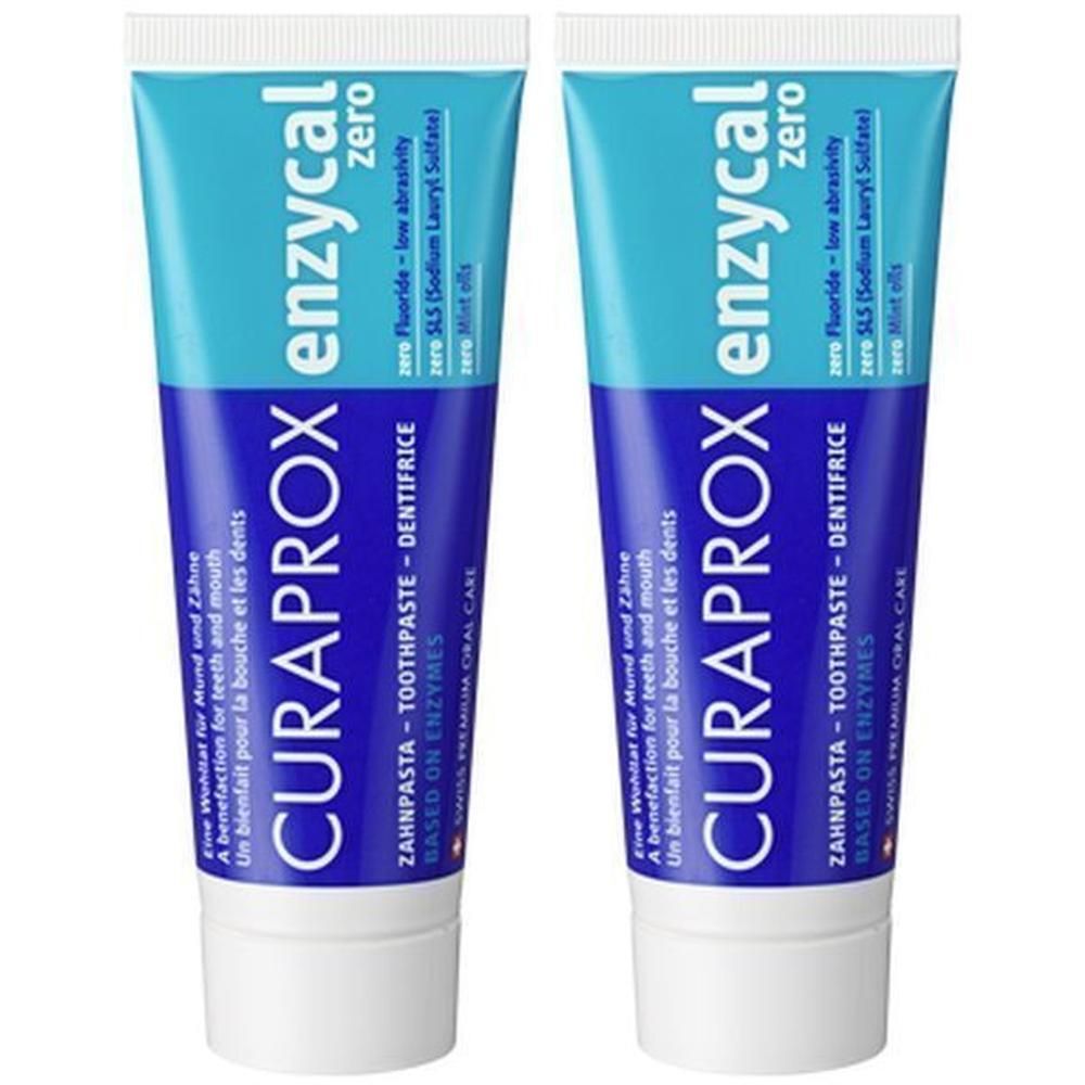 Twee tubes Curaprox Enzycal Zero tandpasta. Blauwe en witte verpakking met turquoise accent.