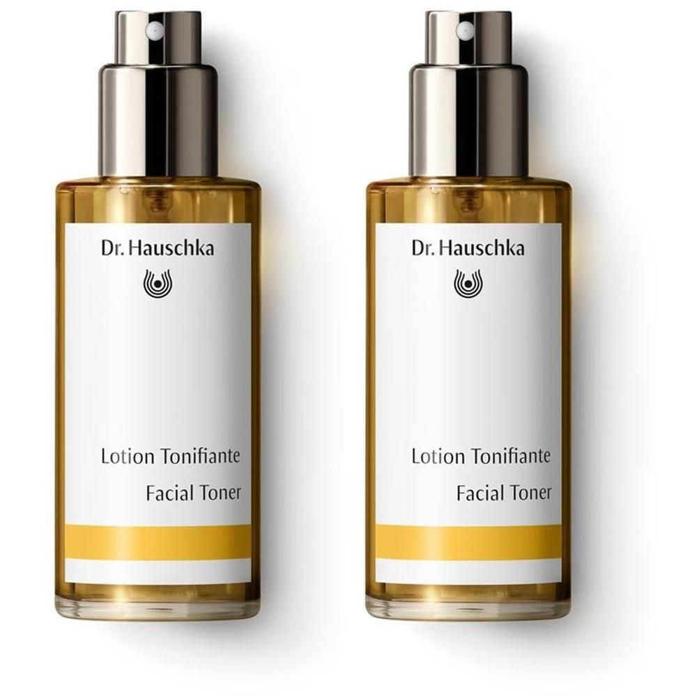 Twee flacons Dr. Hauschka Lotion Tonifiante met spuitkop en wit etiket.
