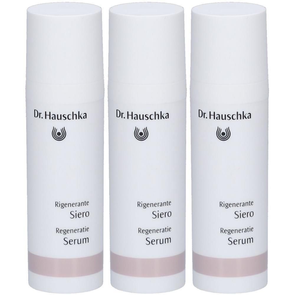 Trois flacons de sérum régénérant Dr. Hauschka avec distributeur à pompe.