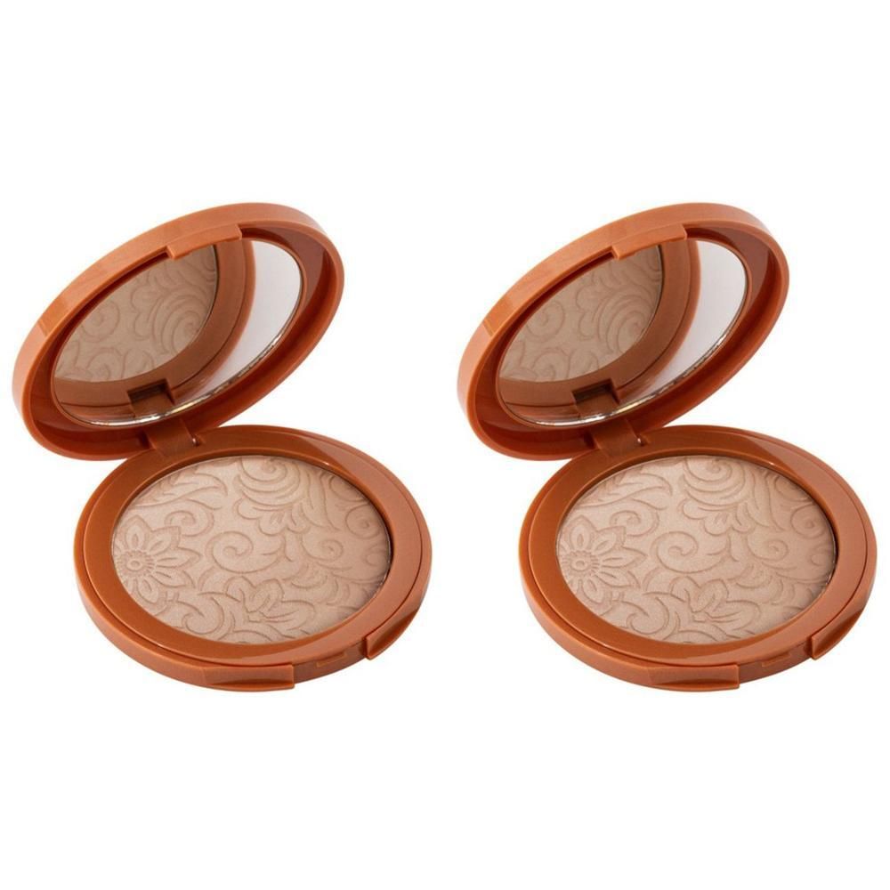 Twee geopende bronzing poeder compacts met spiegel en bloemenpatroon.
