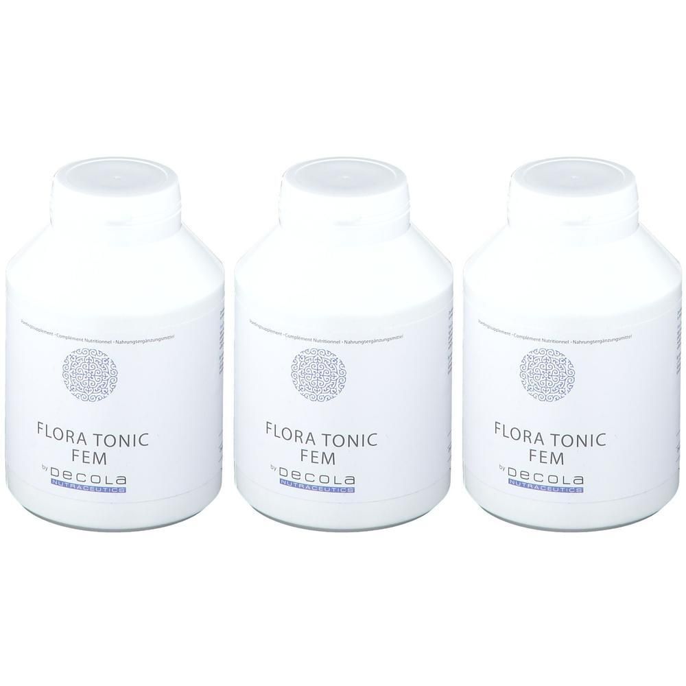 Drie witte flessen met Decola Flora Tonic Fem etiketten.
