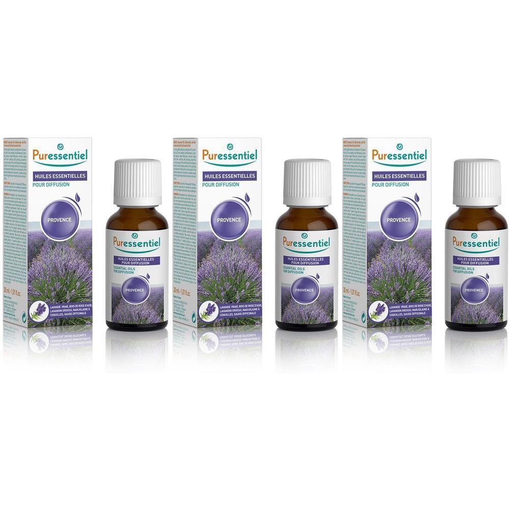 Quatre flacons d'huile essentielle Puressentiel Provence avec motif lavande sur les boîtes.