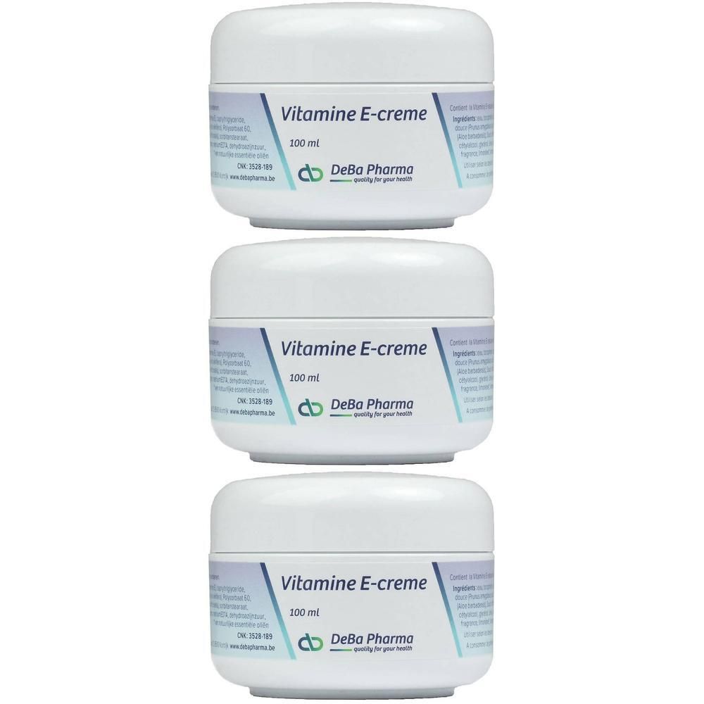 Trois pots blancs de crème à la vitamine E, 100 ml.