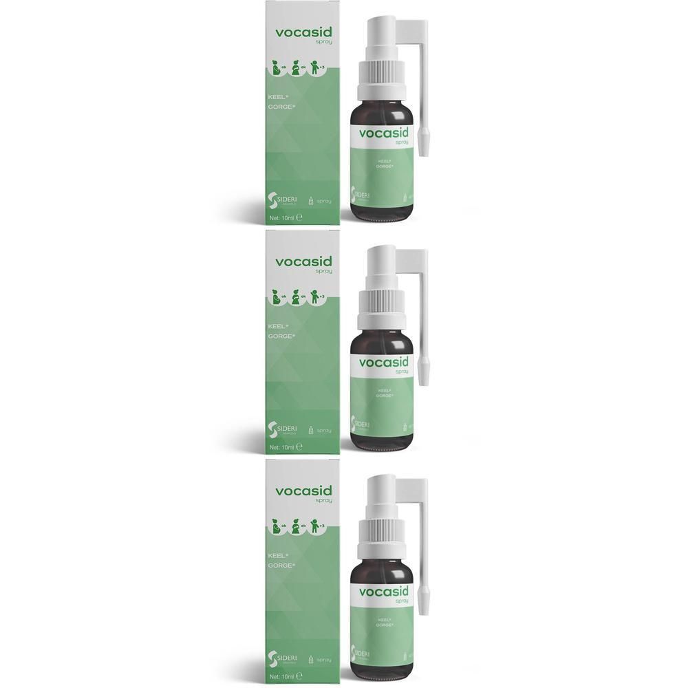 Drie flacons Vocasid Spray met spuitkop en verpakking.