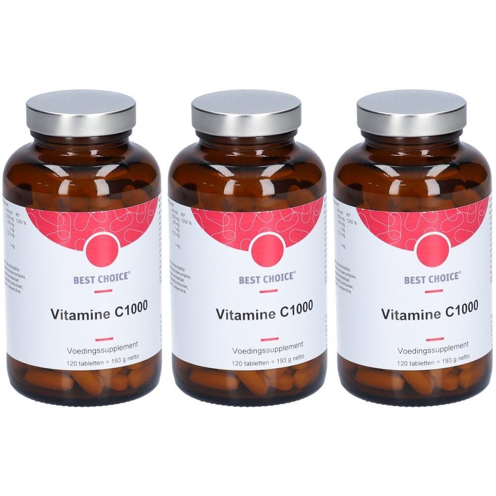 Drie bruine glazen flessen met zilveren schroefdoppen, gevuld met vitamine C tabletten.