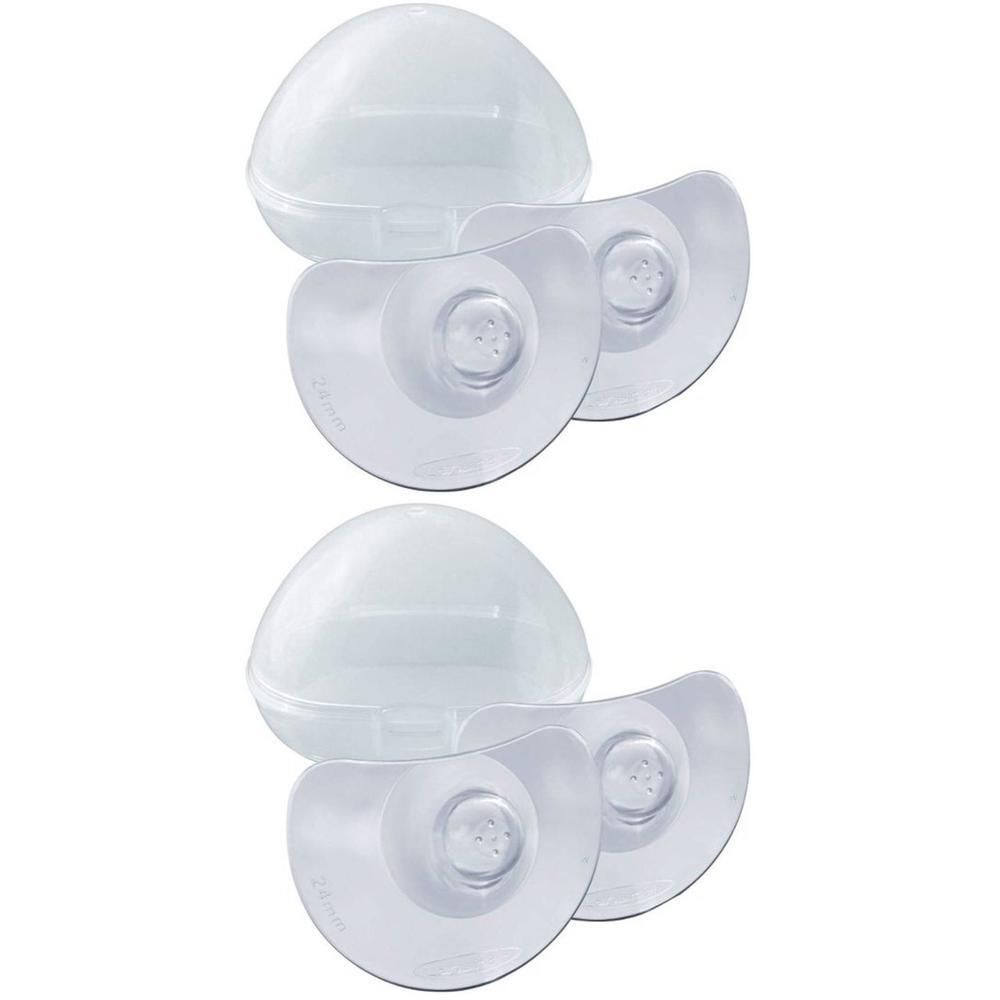 Deux coquilles de protection mammaire transparentes avec capuchons.