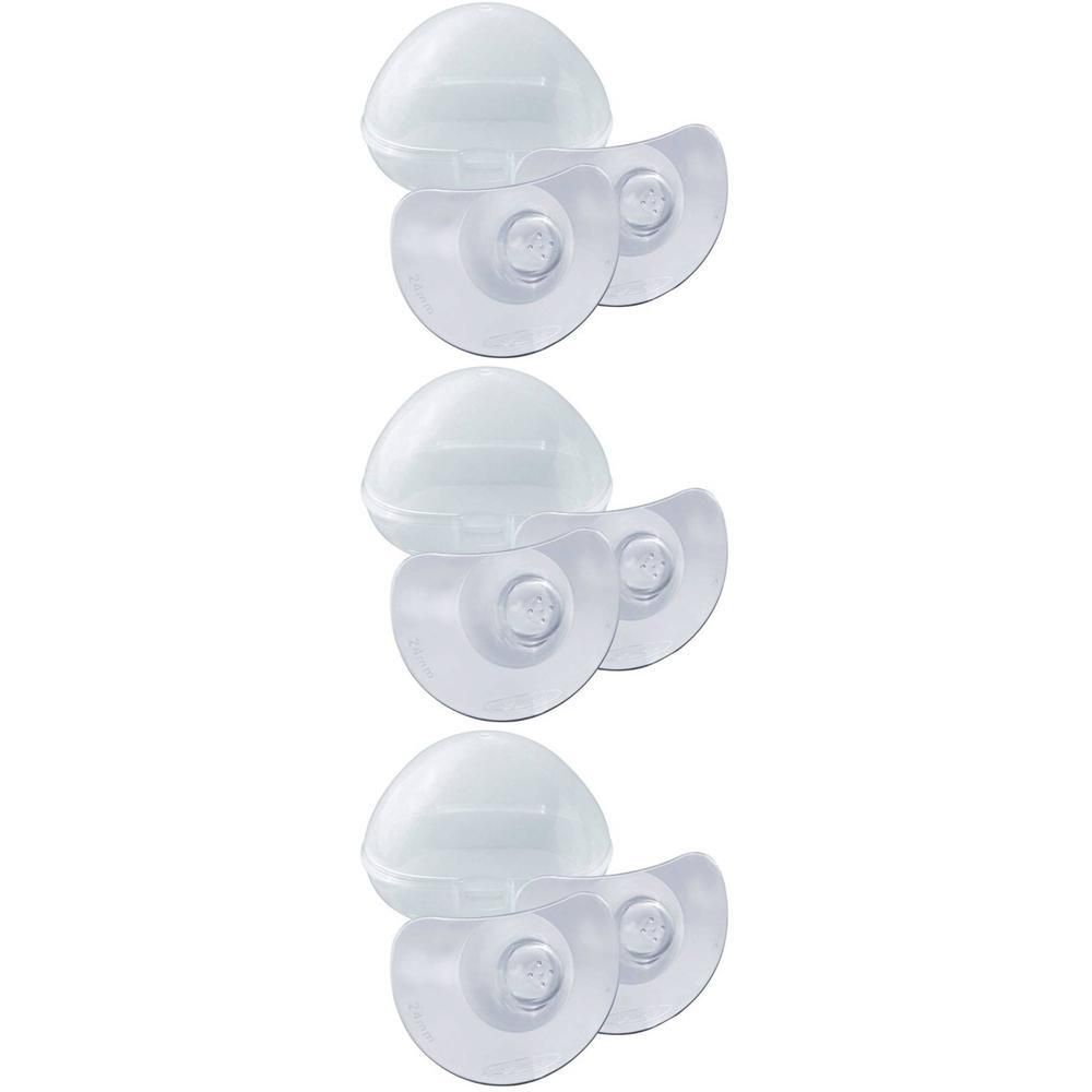 Trois paires de bouts de sein transparents avec capuchons de protection.