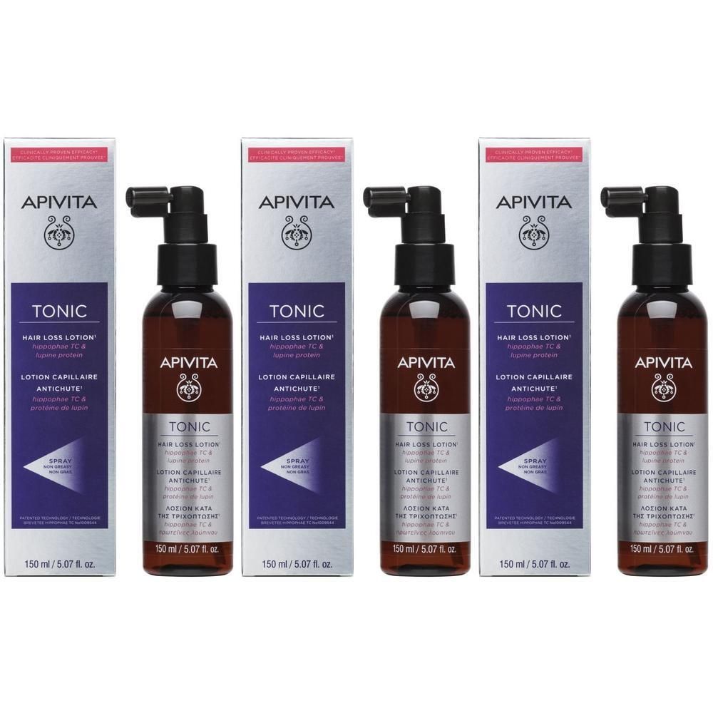 Trois flacons de lotion Apivita Tonic pour la perte de cheveux avec applicateur spray et emballage carton.