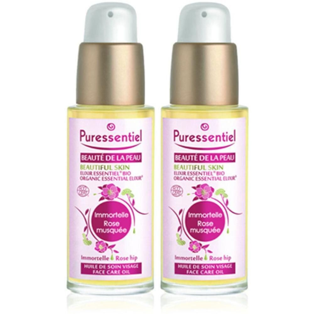 Twee flacons Puressentiel Beauté de la peau Elixir met pompdoseringen.