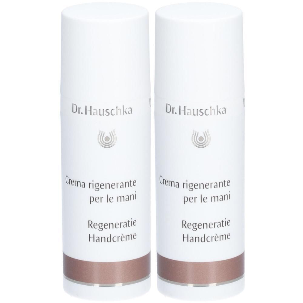 Twee Dr. Hauschka Regenererende Handcrème flacons met pompdoseerders.