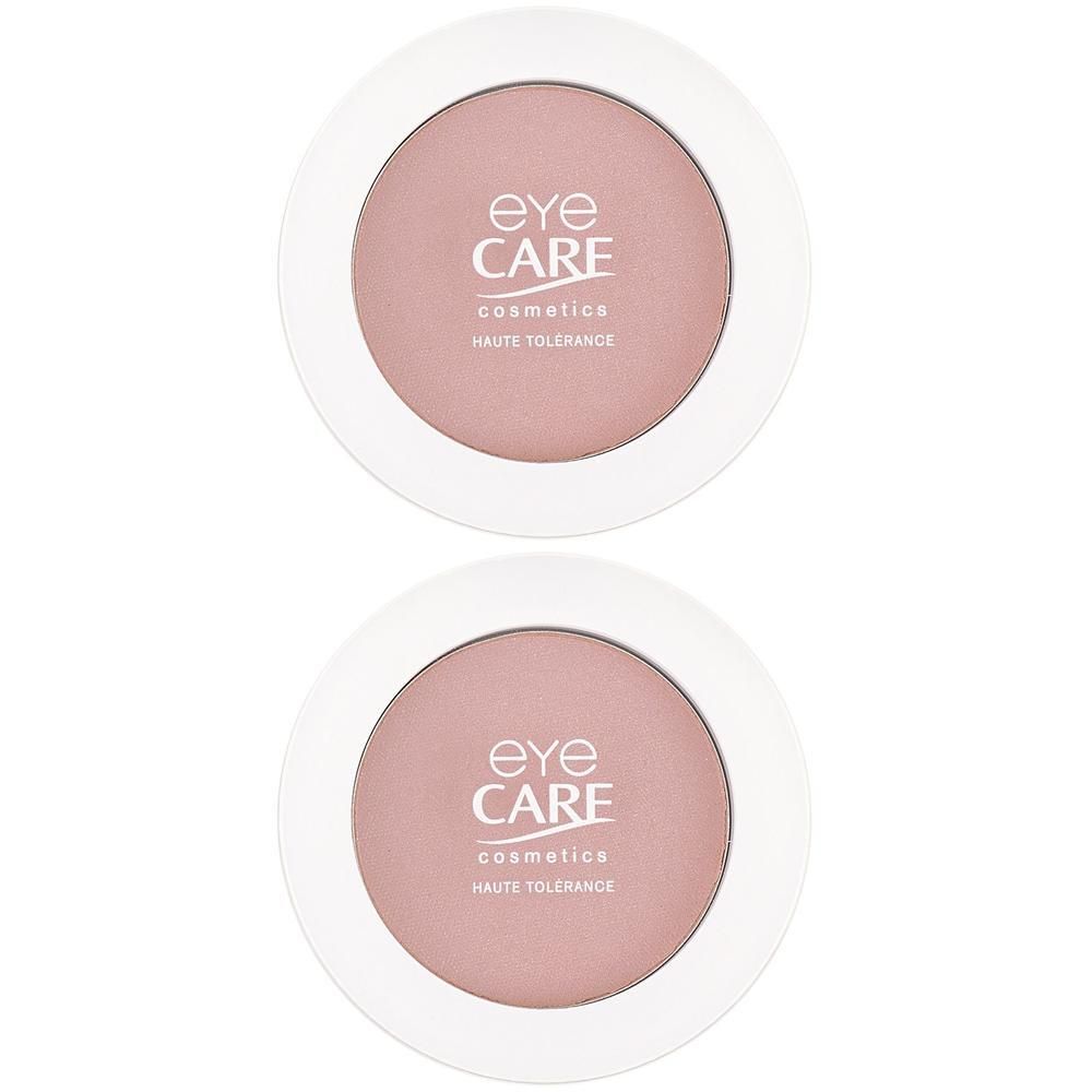Twee ronde, witte doosjes met elk een lichtroze oogschaduw. Merk: Eye Care Cosmetics.