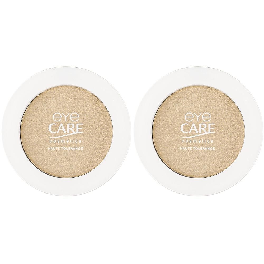 Deux boîtiers ronds de fard à paupières avec remplissage beige. Marque : Eye Care Cosmetics.