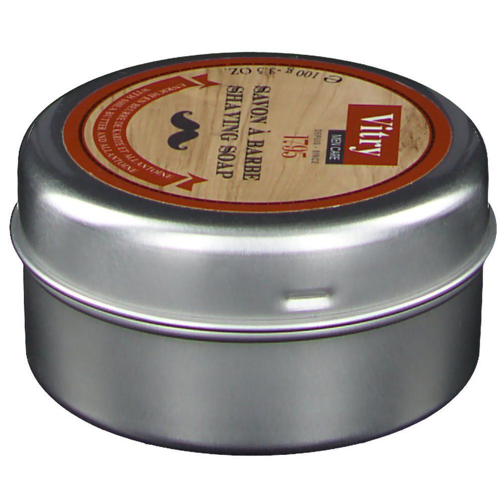 Een blik Vitry Men Care scheerzeep met etiket met houtnerf, snor-icoon en 100g aanduiding.
