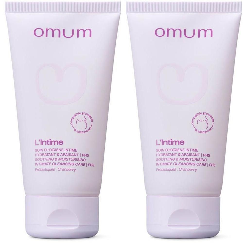 Twee witte tubes Omum L'Intime Intieme Verzorging, met paarse opdruk en hartvormig symbool.