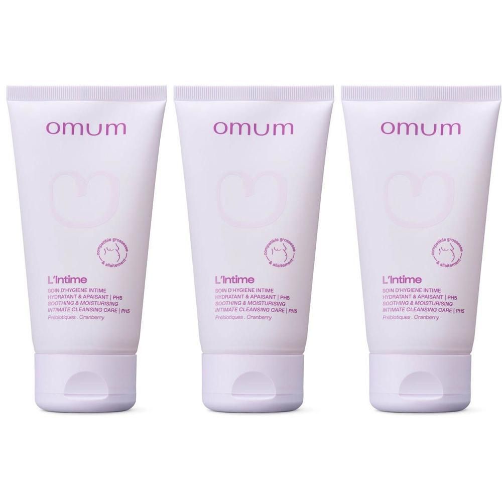 Drie witte tubes Omum L'Intime Intieme verzorging met roze tekst en hartsymbool.