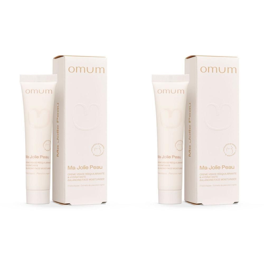 Deux tubes de crème hydratante Omum Ma Jolie Peau avec leurs boîtes.