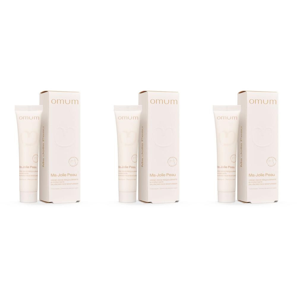 Trois tubes et boîtes Omum Ma Jolie Peau Crème Visage.