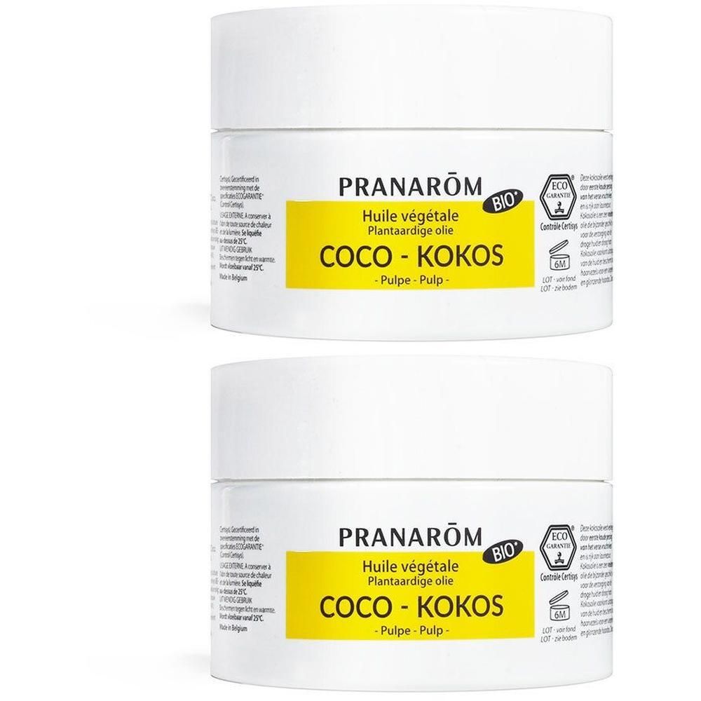 Deux pots blancs d'Huile Végétale Coco Bio Pranarôm.
