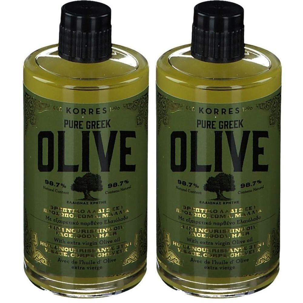Deux bouteilles d'huile d'olive Korres Pure Greek 3-en-1 avec bouchon noir. Étiquettes vertes avec écriture dorée et logo d'arbre.