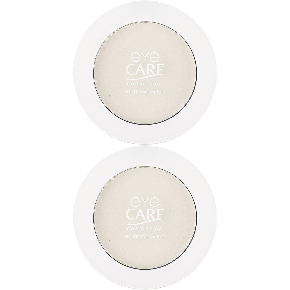 Deux boîtiers ronds blancs de fard à paupières couleur ivoire. Marque : eye CARE.