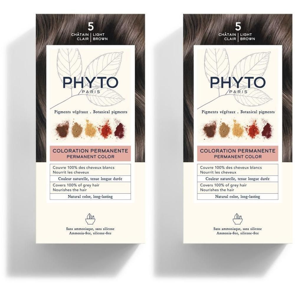 Deux boîtes de Phyto Phytocolor 5 Châtain Clair coloration permanente. Montre des pigments de couleur et des feuilles.