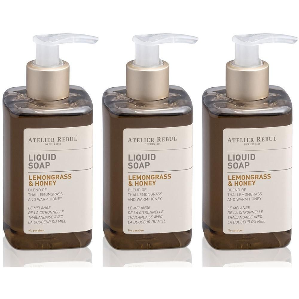 Drie flessen Atelier Rebul Vloeibare Zeep Lemongrass & Honey met pompdispensers.