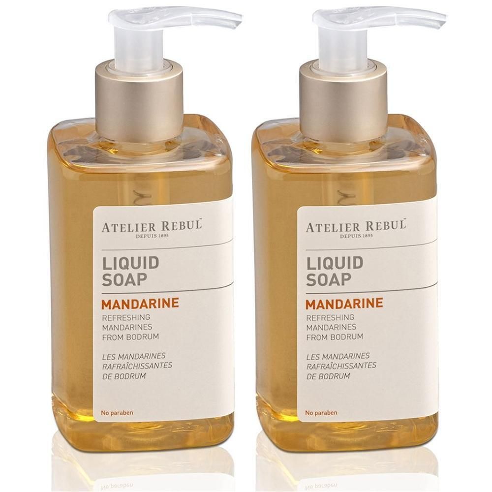 Deux bouteilles de savon liquide Atelier Rebul Mandarine avec distributeurs à pompe.