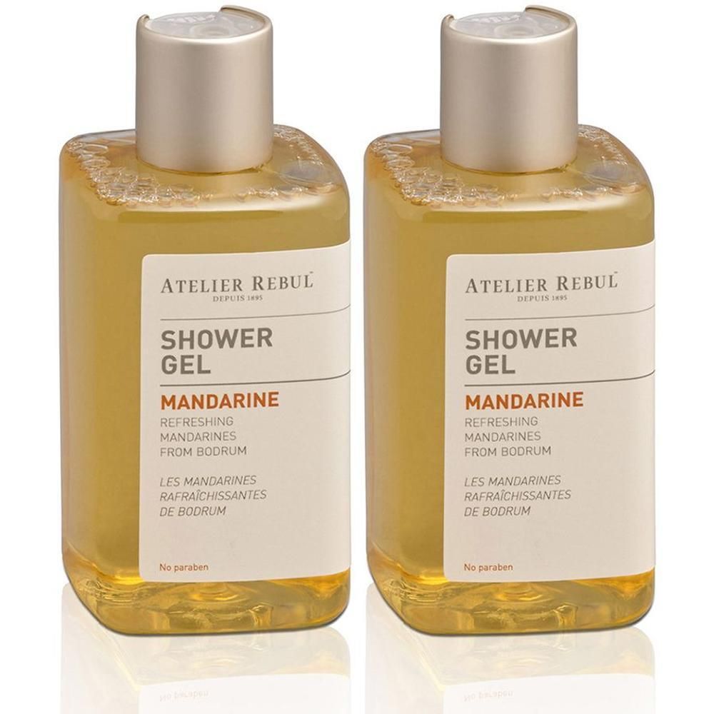 Deux flacons de gel douche Atelier Rebul Mandarine avec bouchons argentés. Liquide jaune clair.