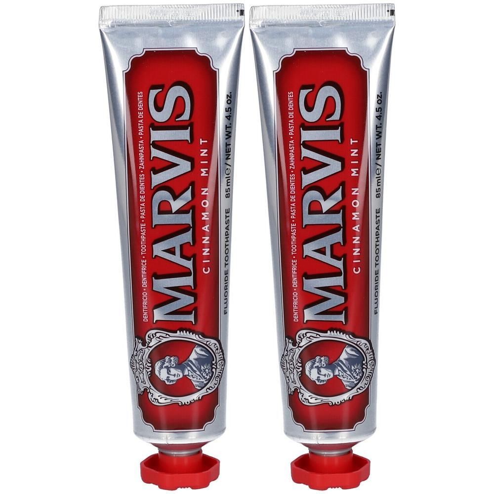 Deux tubes de dentifrice Marvis Cannelle Menthe, étiquette rouge avec accents argentés.