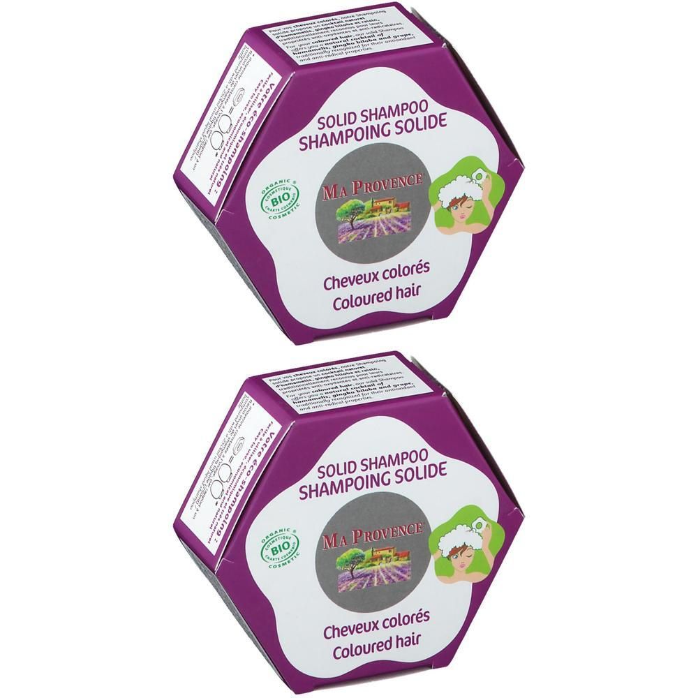Deux boîtes hexagonales de shampoing solide pour cheveux colorés.