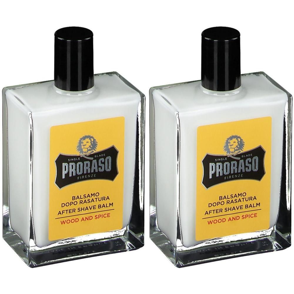 Deux flacons de baume après-rasage Proraso Wood & Spice avec étiquette jaune et bouchon noir.