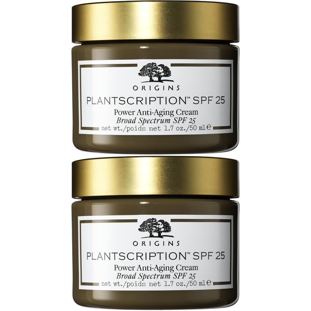 Twee Origins Plantscription SPF 25 potjes met gouden deksels.